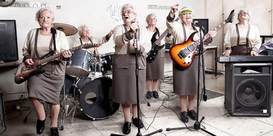 Elderly women playing in a metal band