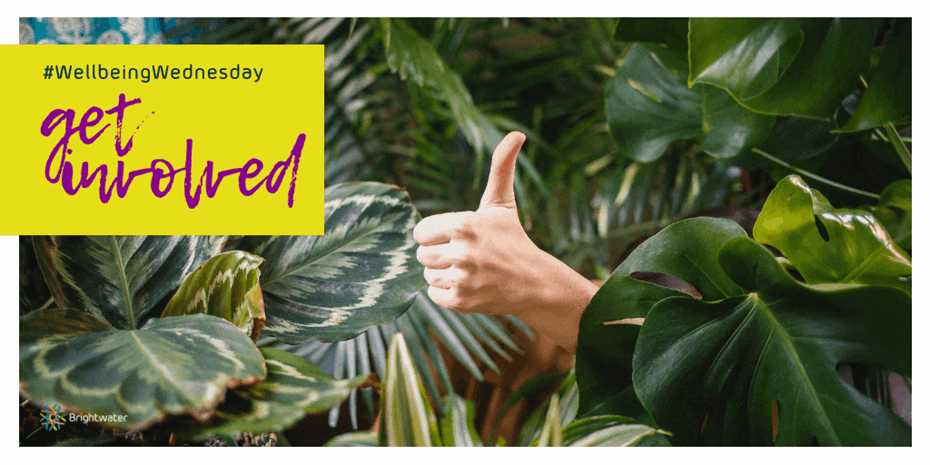 Thumbs up with green leaves