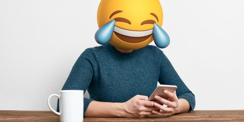 Picture of a person with a laughing out loud emoji face