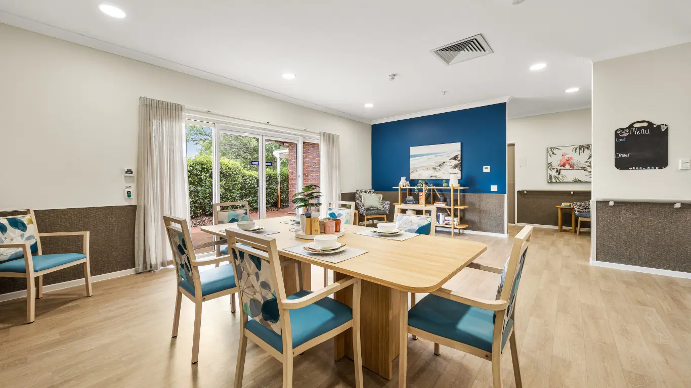 Aylesford Supported Independent Living Home Marangaroo_dining area with menu board and contrast blue wall