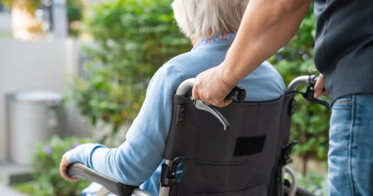 Brightwater TCC Program in Perth_senior woman getting wheeled by family member to her own house to receive care at home