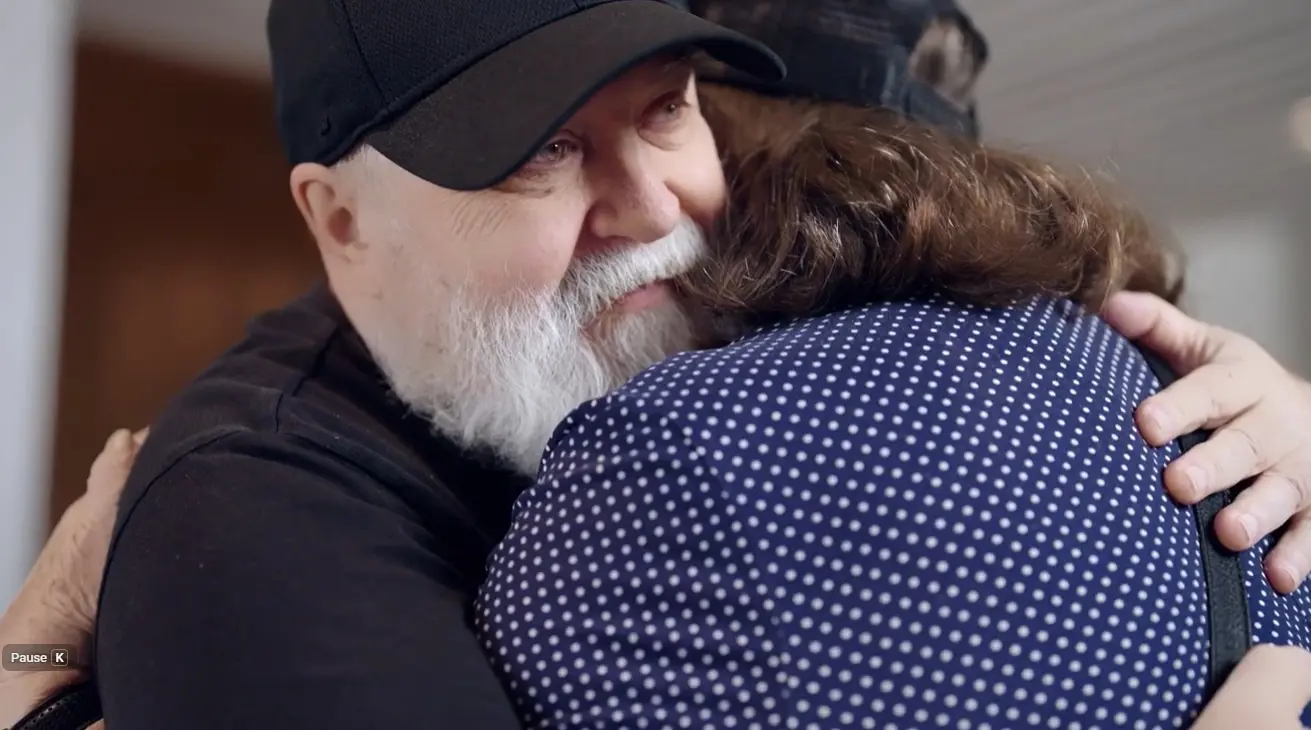 Brightwater at Home client Dorothy with husband Mark embracing each other as they navigate dementia