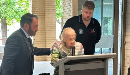 ANZAC Day Service at Brightwater Inglewood Central with Resident Shirley giving a reading