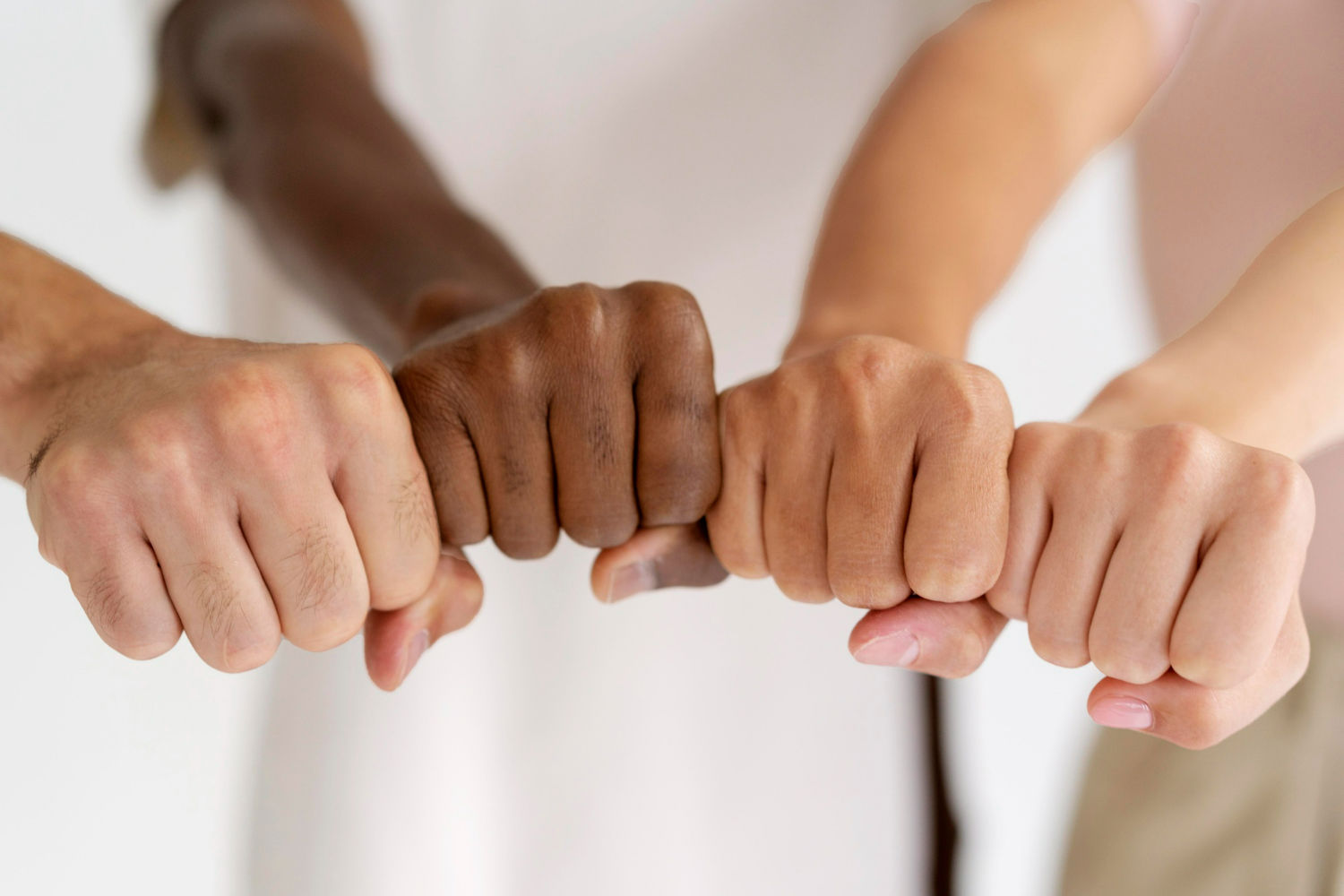 Close Up People Connecting Through Hands Medium