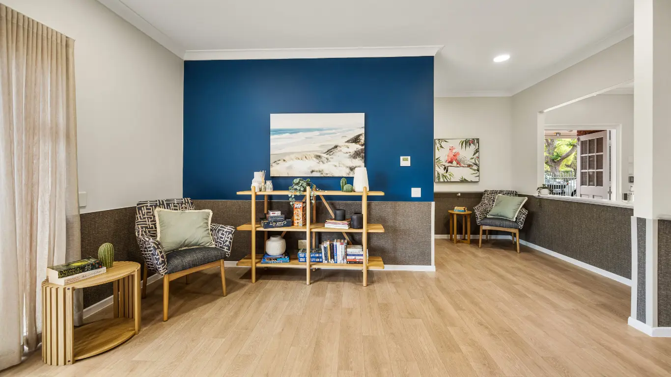 Aylesford Supported Independent Living Home Marangaroo_quiet area with blue wall, occasional chair and books